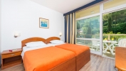 Кровать или кровати в номере Hotel Vis