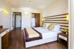 Кровать или кровати в номере Hotel Akbulut & Spa