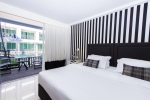 Кровать или кровати в номере Sugar Marina Resort - FASHION - Kata Beach