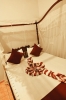 Кровать или кровати в номере The Serendipity Hotel Beach