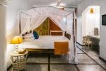 Кровать или кровати в номере Thambapanni Retreat