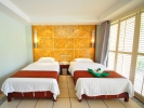 Кровать или кровати в номере Palm Beach Resort & Spa