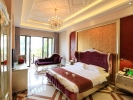 Кровать или кровати в номере Palm Beach Resort & Spa