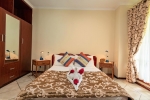 Кровать или кровати в номере Carana Hilltop Villa