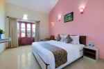 Кровать или кровати в номере The Fern Spazio Leisure Resort, Anjuna Goa