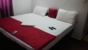 Кровать или кровати в номере Sugar Plum Macedo Palms