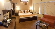 Кровать или кровати в номере La Sunila Suites