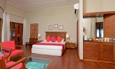 Кровать или кровати в номере Adaaran Club Rannalhi
