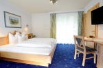 Кровать или кровати в номере Hotel Garni Valülla