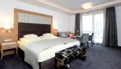 Кровать или кровати в номере Hotel Seespitz
