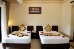 Кровать или кровати в номере Champa Resort & Spa