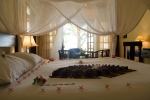 Кровать или кровати в номере Cham Villas Resort