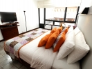Кровать или кровати в номере Hikka Tranz by Cinnamon