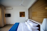 Кровать или кровати в номере Roman Beach