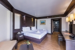 Кровать или кровати в номере Beyond Resort Kata