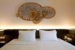 Кровать или кровати в номере Le Meridien Phuket Beach Resort