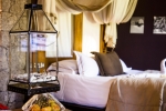 Кровать или кровати в номере Le Domaine de L'Orangeraie Resort and Spa