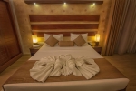 Кровать или кровати в номере Avenra Beach Hikkaduwa