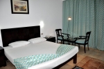Кровать или кровати в номере Elphistone Resort Marsa Alam for families and couples only
