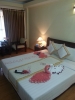 Кровать или кровати в номере Tien Dat Resort