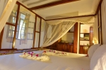 Кровать или кровати в номере Mangrove Lodge