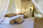 Кровать или кровати в номере Baraza Resort and Spa Zanzibar