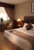 Кровать или кровати в номере Radisson Blu Resort, Sharjah