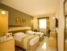 Кровать или кровати в номере Citymax Sharjah