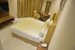 Кровать или кровати в номере Umm Al Quwain Beach Hotel