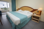 Кровать или кровати в номере Estival Park