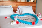 Кровать или кровати в номере Mnarani Beach Cottages