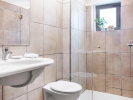 Ванная комната в Grecotel Plaza Spa Apartments