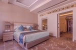 Кровать или кровати в номере Aqua Blu Resort (Families and Couples Only)