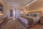 Кровать или кровати в номере Aqua Blu Resort (Families and Couples Only)