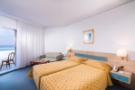 Кровать или кровати в номере Pallini Beach