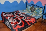 Кровать или кровати в номере Fisherman Guest House