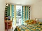 Кровать или кровати в номере Orhidea Park Hotel - All Inclusive