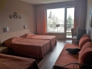 Кровать или кровати в номере Мотиви Отель