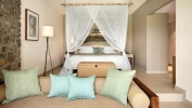 Кровать или кровати в номере Kempinski Seychelles Resort