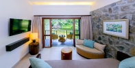 Гостиная зона в Kempinski Seychelles Resort