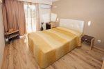 Кровать или кровати в номере Hotel Kotva
