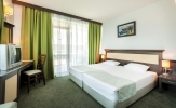 Кровать или кровати в номере Lion Sunny Beach Hotel
