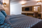 Кровать или кровати в номере Tiara Beach - All Inclusive