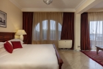 Кровать или кровати в номере Royal Savoy Hotel and Villas
