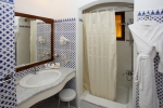 Ванная комната в Domina Oasis Hotel & Resort
