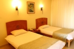 Кровать или кровати в номере Eden Rock Hotel Namaa Bay