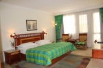 Кровать или кровати в номере Maritim Jolie Ville Resort & Casino
