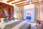 Кровать или кровати в номере Hilton Marsa Alam Nubian Resort