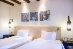 Кровать или кровати в номере Hilton Marsa Alam Nubian Resort