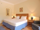 Кровать или кровати в номере Old Palace Resort Sahl Hasheesh